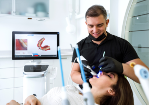 Dentist_scanning_patient_s_teeth_with_a_CEREC_scanner